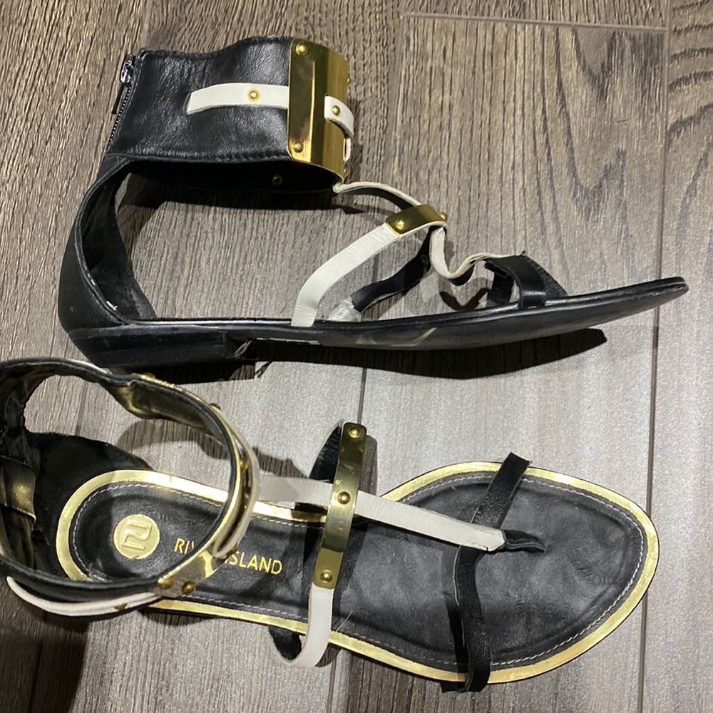 Black and Gold River Island gladiators